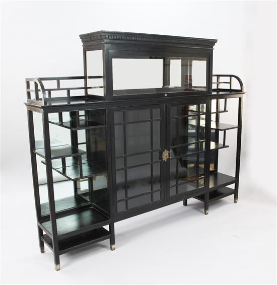 Edward William Godwin (1833-1886) - a rare ebonised mahogany display cabinet, c.1872-75, width 6ft 1.5in., height 4ft 11.5in., 13in. de